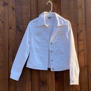 White jean jacket with embellished pockets